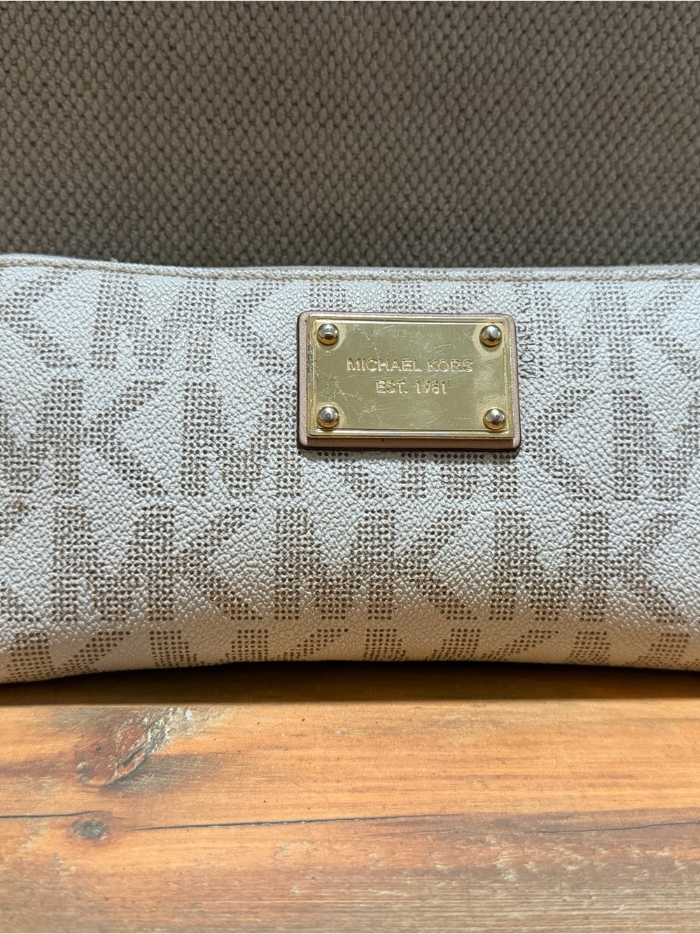 Michael Kors Beige Logo Wristlet with Gold Nameplate